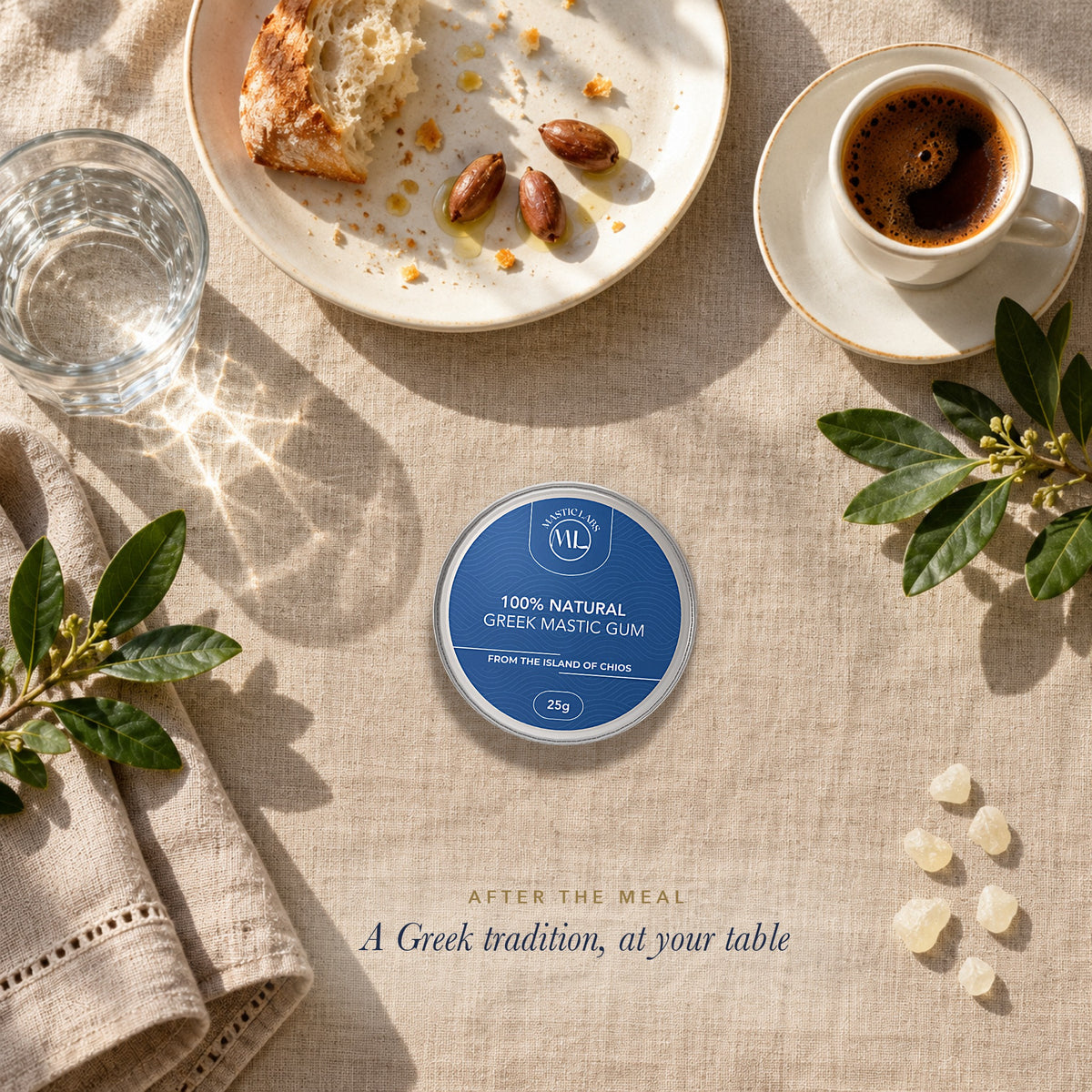 Tin of Greek mastic gum on a linen table after a Mediterranean lunch, with coffee and loose mastic tears